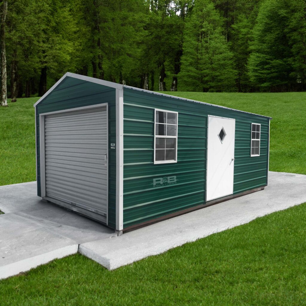 A photo of a green siding and white trim metal steel shed with one single door, two windows, garage roll-up door, on concrete padding.