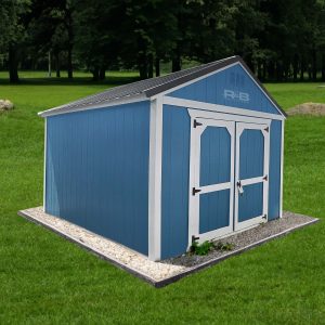 A photo of a blue siding and white trim shed with one double barn door on gravel padding.